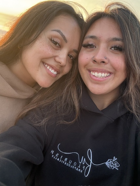 Friends wearing Flourish Unapologetically hoodies